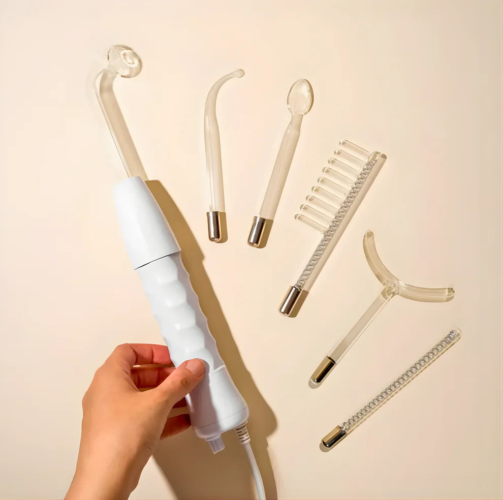 White electronic device with attachments on a beige background