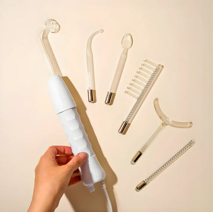 White electronic device with attachments on a beige background