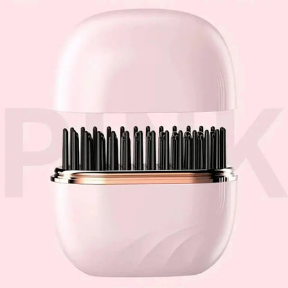 Pink hairbrush with black bristles on a pink background