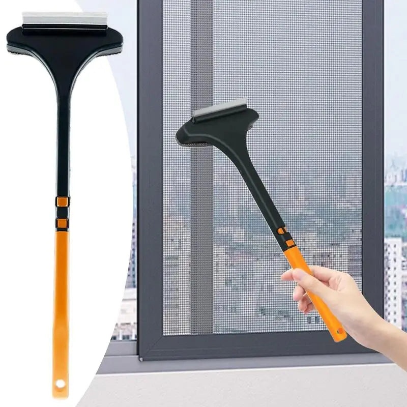 Window cleaning tool with orange handle and black squeegee blade in front of a window.